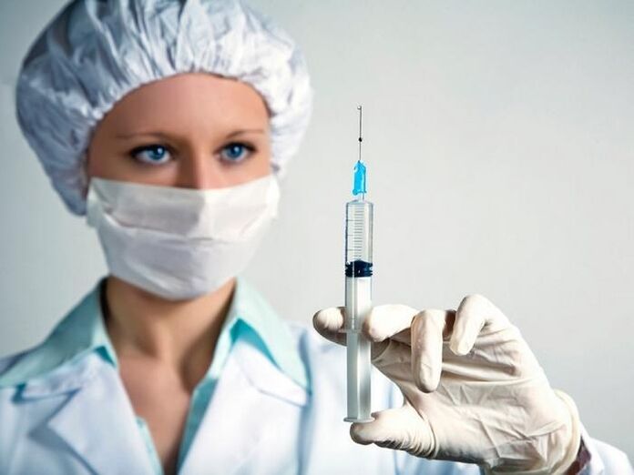 Syringe with vaccine and drinking